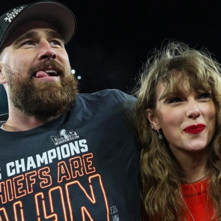 Travis Kelce and Taylor Swift celebrating the Kansas City Chiefs win.