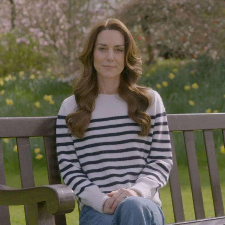 A still from a video of Princess Catherine sitting on a bench.